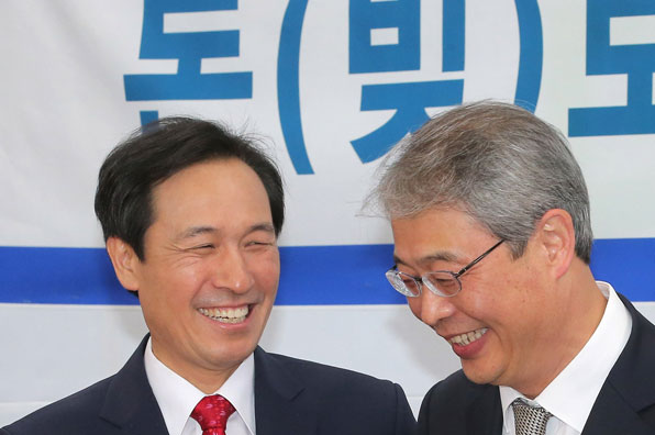 더불어민주당 우상호 원내대표와 임종룡 금융위원장