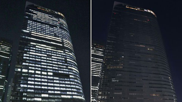 지난 21일 밤 10시(왼쪽)와 24일 밤 10시의 도쿄 미나토구 덴쓰 본사 건물 전경. (도쿄 교도=연합뉴스)