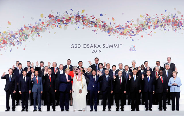 지난해 11월 일본 오사카에서 열린 G20 정상회의에서 각국 정상들이 기념 촬영을 하고 있다.
