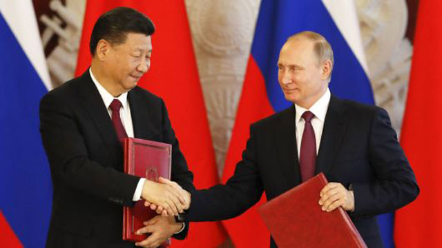 지난해 정상회담 직후 악수하는 시진핑과 푸틴