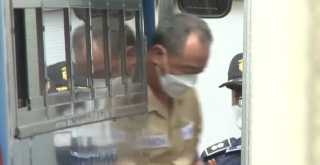 지난해 재판에 참석하기 위해 법정에 들어서고 있는 김시남의 모습