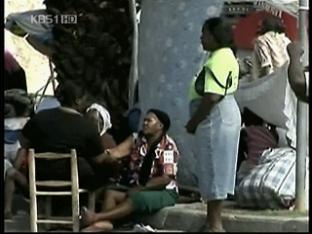아이티는 전시 난민촌…도미니카 탈출 행렬도