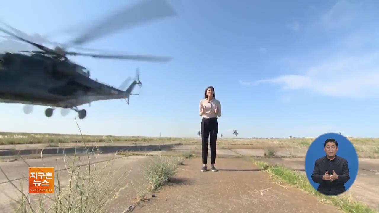 [지구촌 화제 영상] 헬기가 머리 스칠 듯…여기자의 대담한 보도 현장
