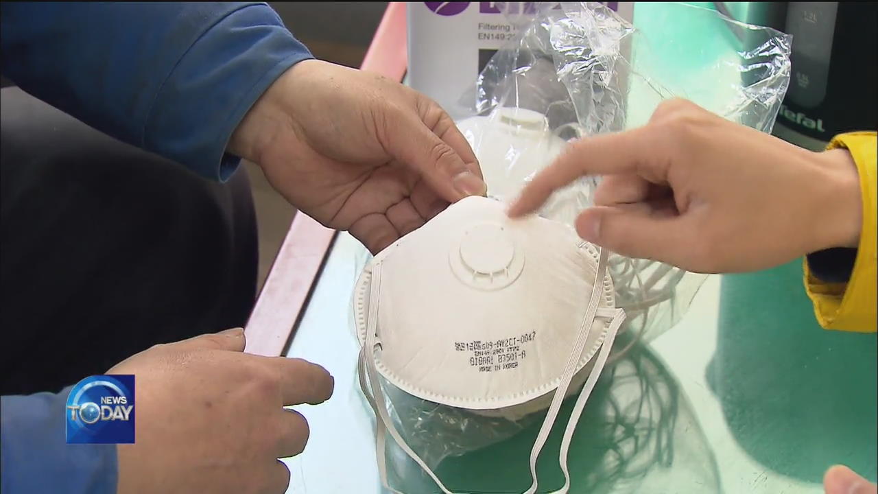 INDUSTRIAL WORKERS SHORT OF PROTECTIVE MASKS