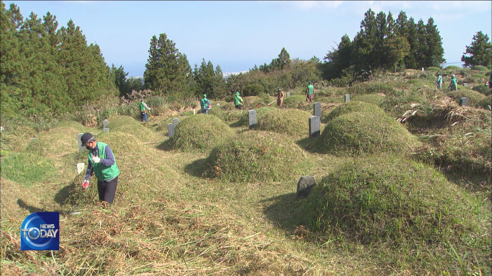 VOLUNTEERS TIDYING GRAVE SITES