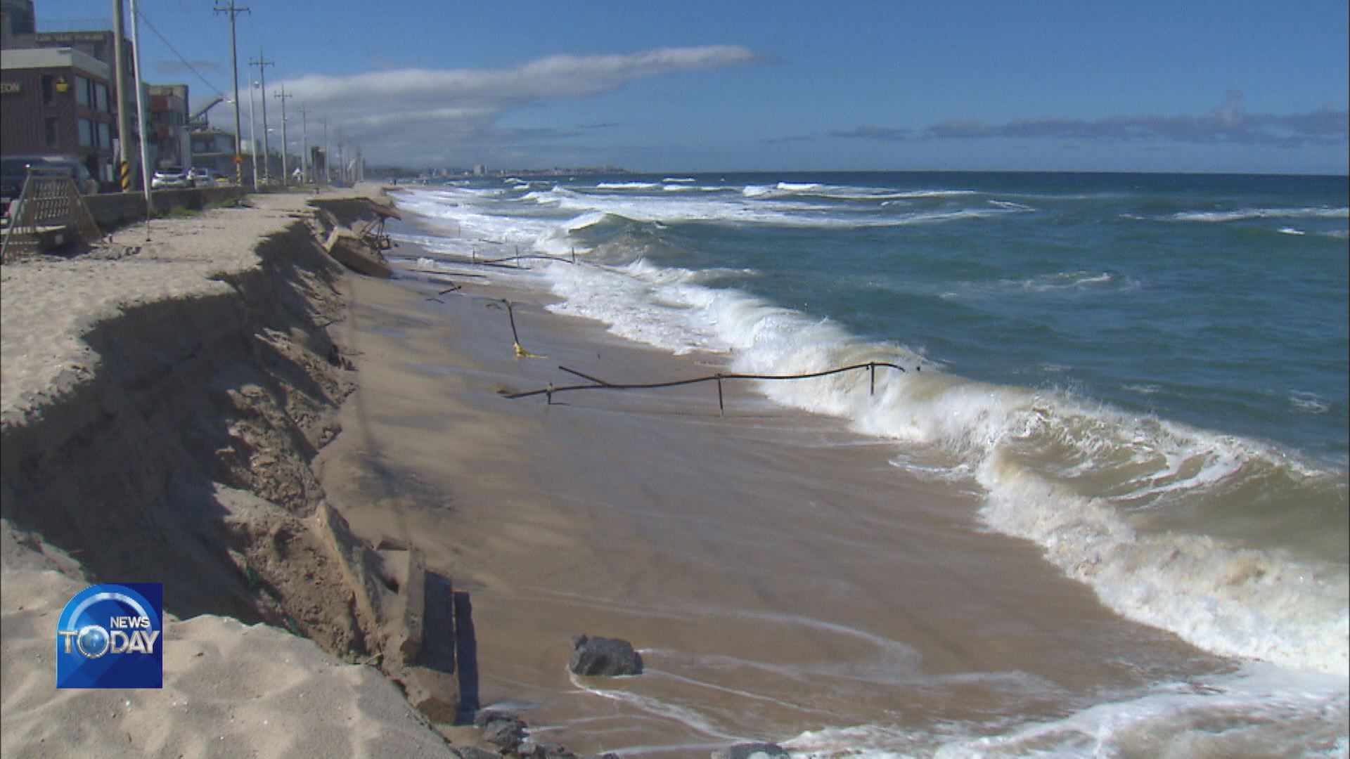 COASTAL EROSION THREATENS NEIGHBORHOOD