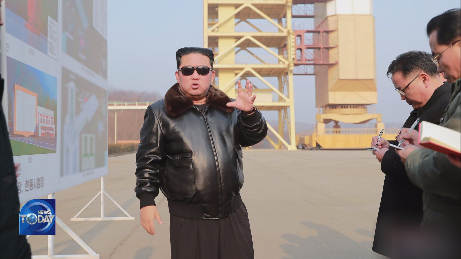 KIM VISITS SATELLITE LAUNCH SITE