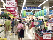 [심층취재]할인점 영업 시간 제한 논란 