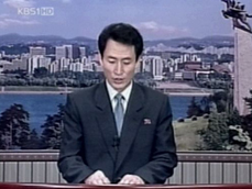 북한도 동시 발표, 언론보도 차분 