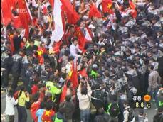 베이징 올림픽 성화 봉송 곳곳서 충돌 