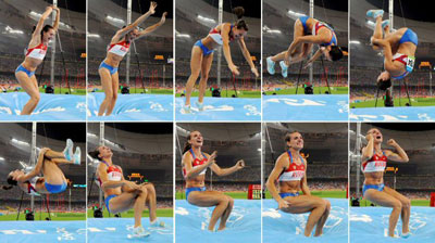 18일 냐오차오(鳥巢), 새 둥지로 불리는 궈자티위창(國家體育場)에서 벌어진 베이징올림픽 여자 장대높이뛰기 결승에서 이신바예바가  5ｍ5의 장대를 넘고 기뻐하며 덤블링 세리머니를 보여주고 있다. 