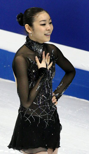 '피겨 퀸' 김연아가 5일 오후 밴쿠버 퍼시픽 콜리시움에서 열린 2009 국제빙상경기연맹(ISU) 4대륙 피겨선수권대회 여자 싱글 쇼트프로그램을 완벽하게 마친 뒤 밝은 표정을 보이고 있다. 