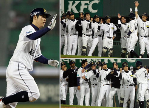  19일 오후 서울 잠실야구장에서 열린 프로야구 두산과 롯데의 경기에서 8회말 무사 두산 이원석이 솔로홈런을 날린 후 동료들의 축하를 받고 있다. 