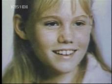 ‘등교 중 납치’ 미국 소녀, 18년 만에 귀가 